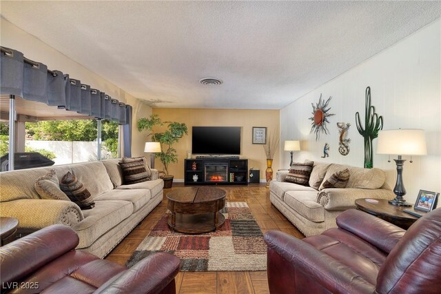4219 E Pinecrest Cir, Las Vegas, NV 89121 - living area featuring a textured ceiling