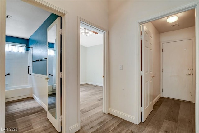 7417 Radville Dr, Las Vegas, NV 89129 - hallway with wood finished floors and baseboards