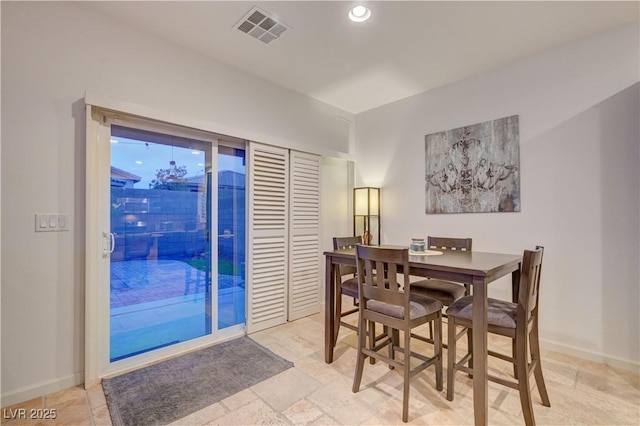 7235 Summer Air Ave, Las Vegas, NV 89179 - dining area with light stone finish flooring and recessed lighting