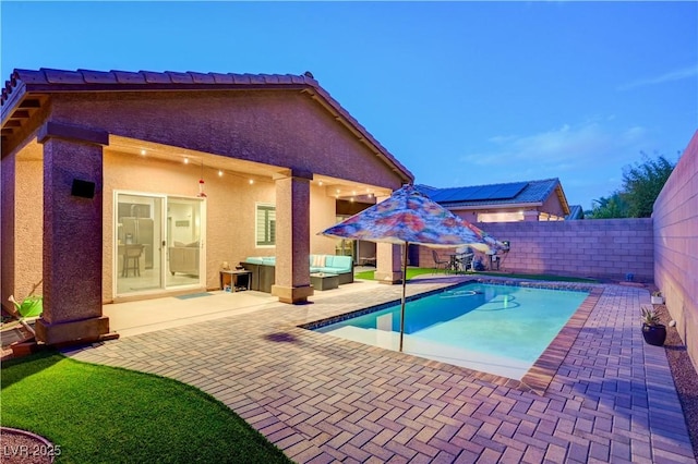 7235 Summer Air Ave, Las Vegas, NV 89179 - view of pool featuring a patio, a fenced backyard, and an outdoor hangout area