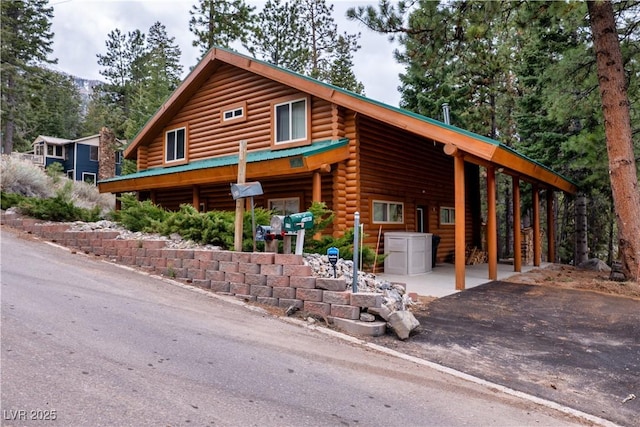 401 Alpine Way, Las Vegas, NV 89124 - log-style house featuring log exterior and driveway
