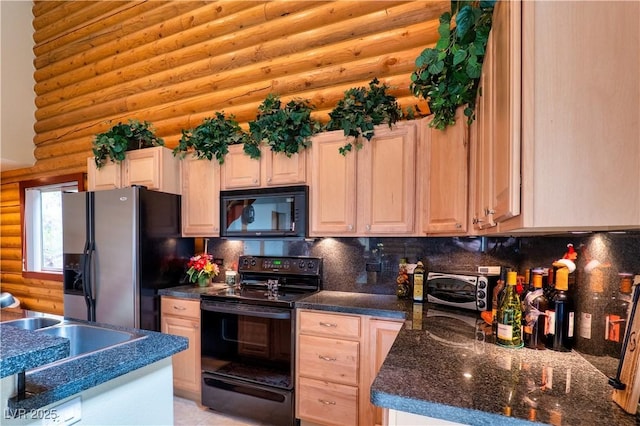 401 Alpine Way, Las Vegas, NV 89124 - kitchen with black appliances, rustic walls, backsplash, and a sink
