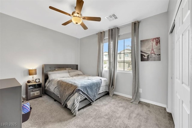 7115 Calvert Cliffs St, North Las Vegas, NV 89084 - bedroom featuring a closet, light colored carpet, baseboards, and a ceiling fan