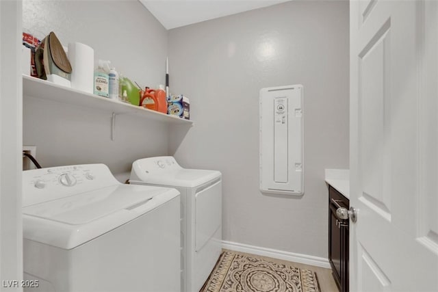 7115 Calvert Cliffs St, North Las Vegas, NV 89084 - washroom featuring washing machine and clothes dryer, baseboards, and electric panel