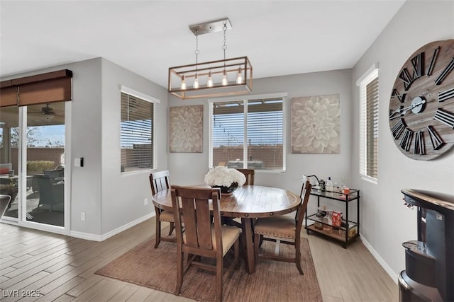 7115 Calvert Cliffs St, North Las Vegas, NV 89084 - dining space featuring light wood-type flooring and baseboards