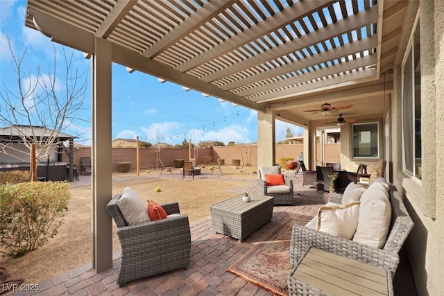 7115 Calvert Cliffs St, North Las Vegas, NV 89084 - fenced backyard featuring an outdoor living space, a pergola, a patio, and a ceiling fan