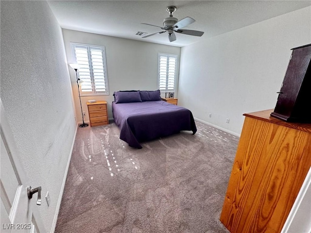 7035 Thistle Ridge St, Las Vegas, NV 89166 - carpeted bedroom featuring a textured wall, baseboards, and ceiling fan