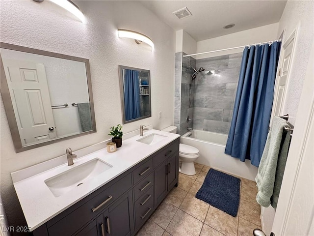 7035 Thistle Ridge St, Las Vegas, NV 89166 - full bathroom featuring toilet, double vanity, shower / bath combination with curtain, and tile patterned flooring