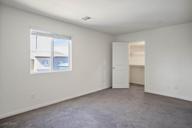 532 Clearsable Ave, Henderson, NV 89044 - unfurnished bedroom with carpet floors, baseboards, a spacious closet, and a closet