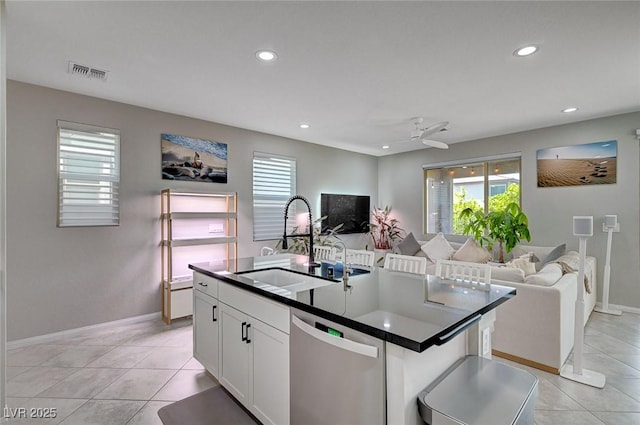 4160 Elegant Chateau St, Las Vegas, NV 89135 - kitchen featuring stainless steel dishwasher, a sink, open floor plan, plenty of natural light, and recessed lighting