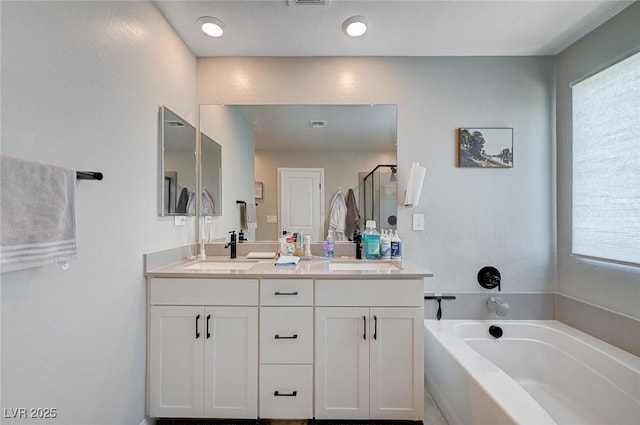 4160 Elegant Chateau St, Las Vegas, NV 89135 - bathroom with a garden tub, a shower stall, and double vanity