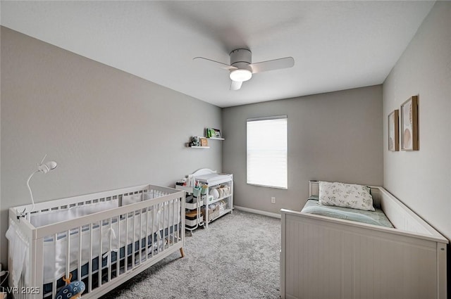 4160 Elegant Chateau St, Las Vegas, NV 89135 - carpeted bedroom featuring a nursery area, a ceiling fan, and baseboards