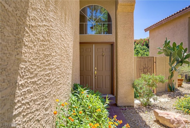 7813 Paper Flower Ct, Las Vegas, NV 89128 - doorway to property featuring stucco siding