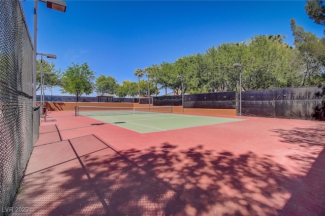 7813 Paper Flower Ct, Las Vegas, NV 89128 - view of tennis court with community basketball court