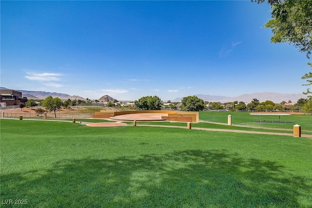 7813 Paper Flower Ct, Las Vegas, NV 89128 - view of home's community featuring a mountain view and a lawn