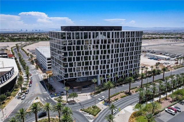 7813 Paper Flower Ct, Las Vegas, NV 89128 - view of building exterior with a city view