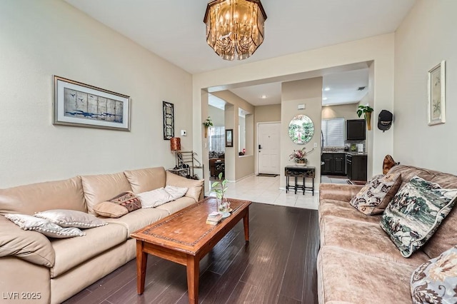310 Pissarro Pl, Henderson, NV 89074 - living room featuring a chandelier and light wood-type flooring