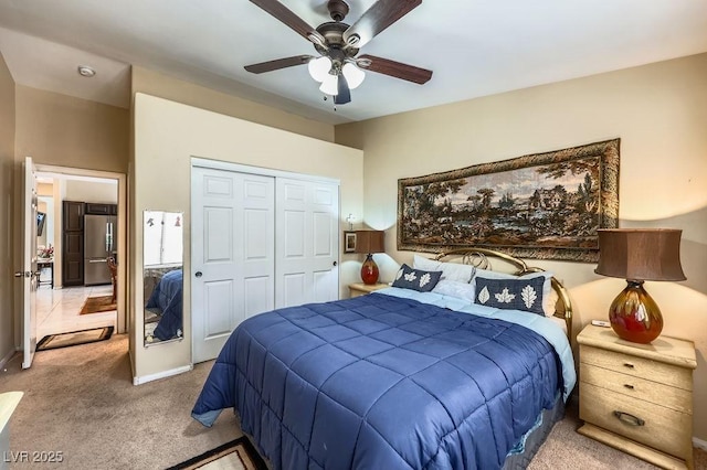 310 Pissarro Pl, Henderson, NV 89074 - bedroom with stainless steel refrigerator, carpet flooring, a closet, and ceiling fan