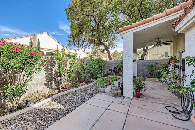 310 Pissarro Pl, Henderson, NV 89074 - fenced backyard with a patio area and ceiling fan