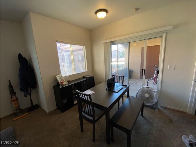 9580 W Reno Ave Unit 283, Las Vegas, NV 89148 - dining space featuring light colored carpet and a desk