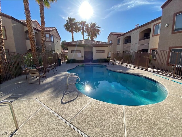 9580 W Reno Ave Unit 283, Las Vegas, NV 89148 - community pool with a patio, a residential view, and cooling unit