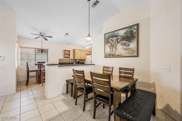 3121 Fontana Colony Ct, North Las Vegas, NV 89031 - dining space with ceiling fan, light tile patterned floors, and vaulted ceiling