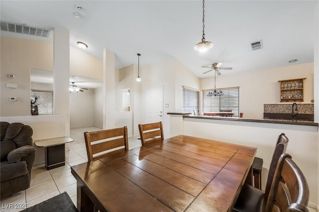 3121 Fontana Colony Ct, North Las Vegas, NV 89031 - dining space featuring a ceiling fan, lofted ceiling, and light tile patterned flooring
