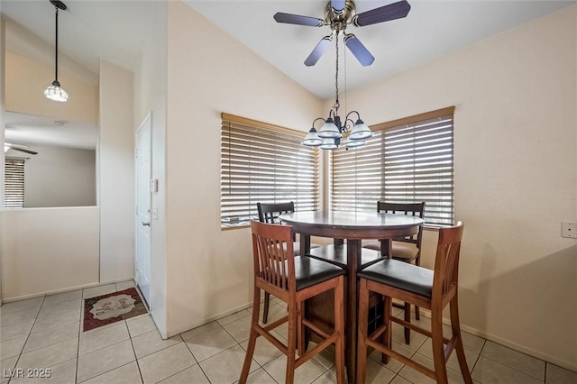 3121 Fontana Colony Ct, North Las Vegas, NV 89031 - dining area featuring lofted ceiling, plenty of natural light, a ceiling fan, a chandelier, and light tile patterned floors