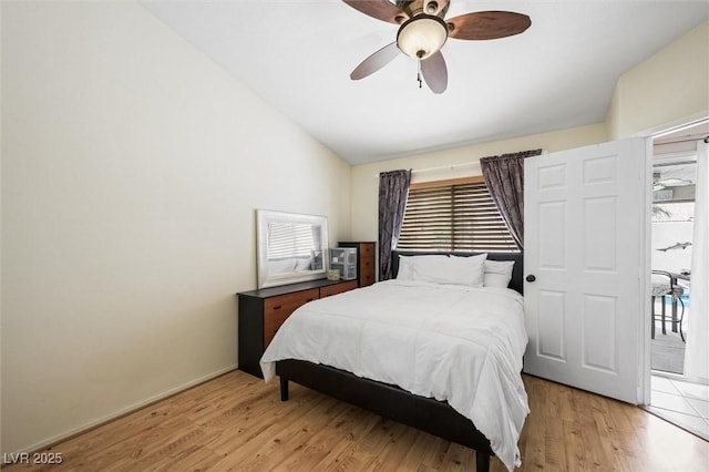 3121 Fontana Colony Ct, North Las Vegas, NV 89031 - bedroom with lofted ceiling, light wood-style floors, ceiling fan, and baseboards