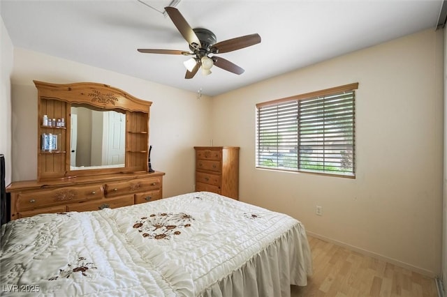 3121 Fontana Colony Ct, North Las Vegas, NV 89031 - bedroom with baseboards, light wood-style floors, and ceiling fan