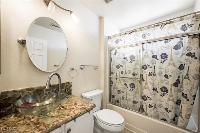 3121 Fontana Colony Ct, North Las Vegas, NV 89031 - bathroom with bath / shower combo with glass door, vanity, and toilet