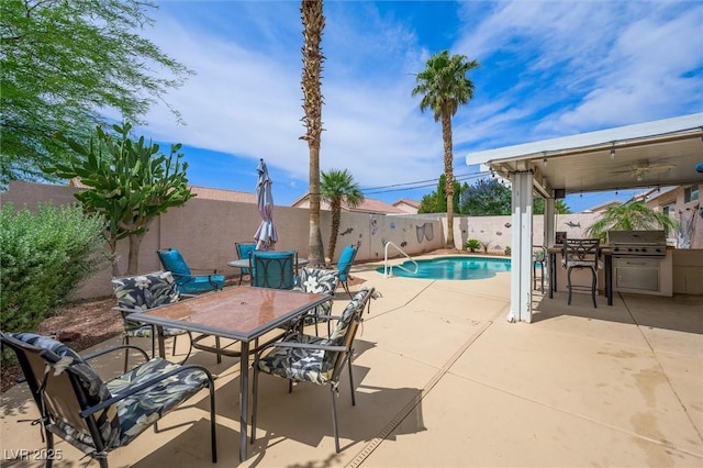 3121 Fontana Colony Ct, North Las Vegas, NV 89031 - view of swimming pool with a fenced backyard, outdoor dining space, a patio, and a grill