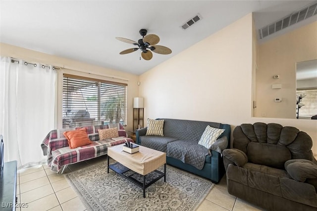 3121 Fontana Colony Ct, North Las Vegas, NV 89031 - living room with light tile patterned flooring, lofted ceiling, and ceiling fan
