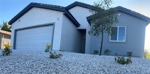 1905 Harvard St, North Las Vegas, NV 89030 - ranch-style house featuring an attached garage and stucco siding