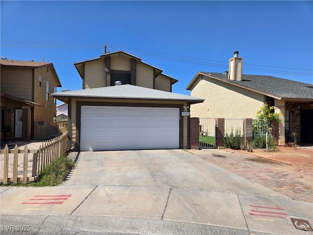 4612 Supreme Ct, Las Vegas, NV 89110 - view of front facade featuring driveway and a chimney