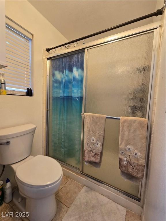 4612 Supreme Ct, Las Vegas, NV 89110 - full bath with a shower stall, tile patterned floors, and toilet