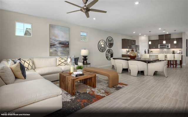 2607 Regency Cove Ct Lot 11, Las Vegas, NV 89121 - living room featuring ceiling fan, recessed lighting, plenty of natural light, and baseboards