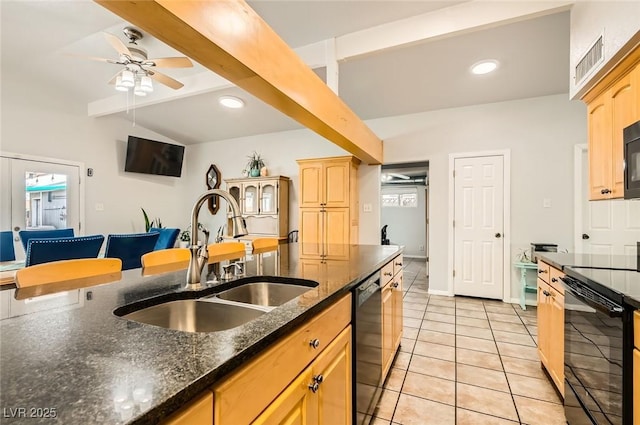 5217 Champions Ave, Las Vegas, NV 89142 - kitchen featuring a sink, black appliances, light tile patterned floors, ceiling fan, and dark stone counters