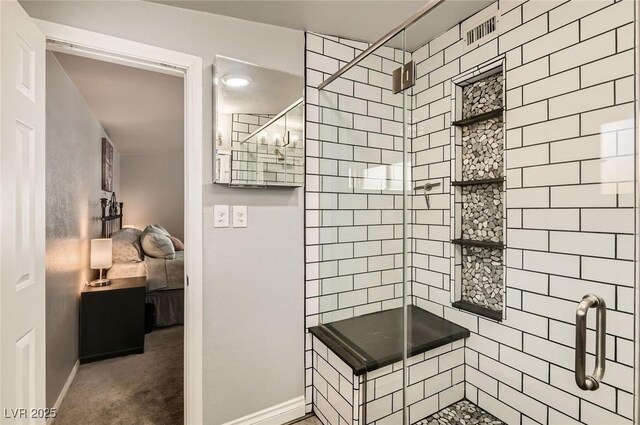 5217 Champions Ave, Las Vegas, NV 89142 - bathroom with a stall shower and baseboards