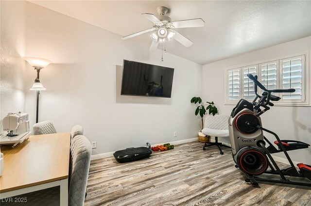 5217 Champions Ave, Las Vegas, NV 89142 - exercise area featuring wood finished floors, ceiling fan, baseboards, and vaulted ceiling
