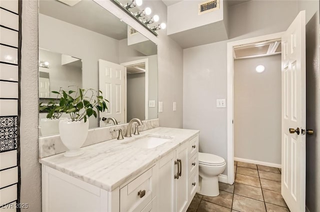 5217 Champions Ave, Las Vegas, NV 89142 - bathroom featuring vanity, toilet, and tile patterned flooring