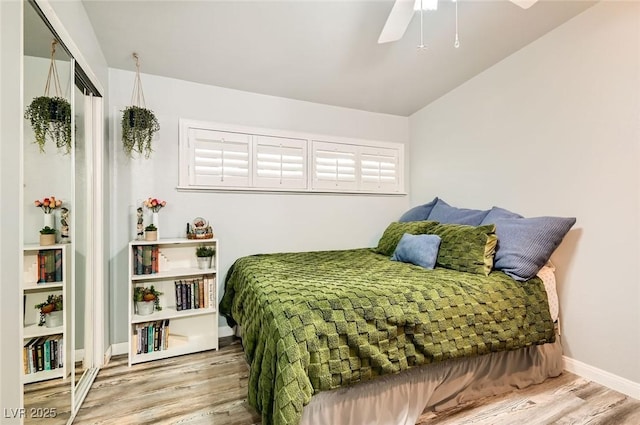 5217 Champions Ave, Las Vegas, NV 89142 - bedroom with wood finished floors, baseboards, a ceiling fan, and a closet