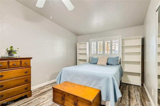 5217 Champions Ave, Las Vegas, NV 89142 - bedroom featuring wood finished floors, baseboards, and a ceiling fan