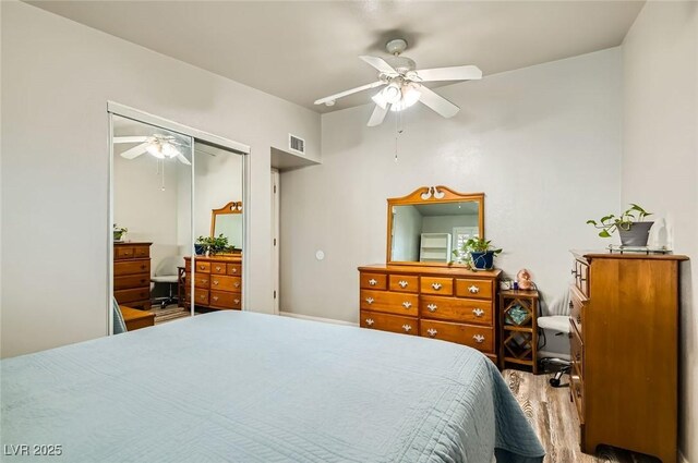 5217 Champions Ave, Las Vegas, NV 89142 - bedroom featuring wood finished floors, a ceiling fan, and a closet