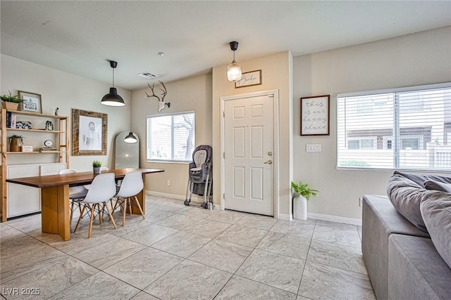 4833 Straight Flush Dr Unit 103, Las Vegas, NV 89122 - dining area featuring baseboards