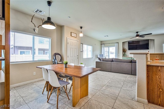 4833 Straight Flush Dr Unit 103, Las Vegas, NV 89122 - dining space featuring ceiling fan and baseboards