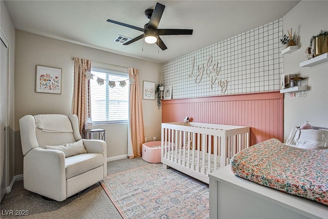 4833 Straight Flush Dr Unit 103, Las Vegas, NV 89122 - carpeted bedroom with ceiling fan and baseboards