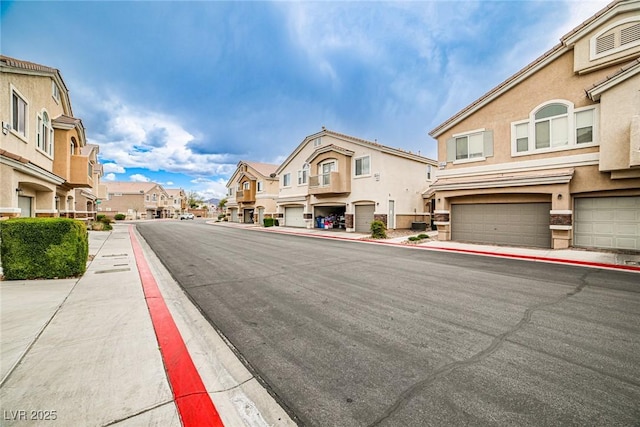 4833 Straight Flush Dr Unit 103, Las Vegas, NV 89122 - view of asphalt street with sidewalks, a residential view, and curbs