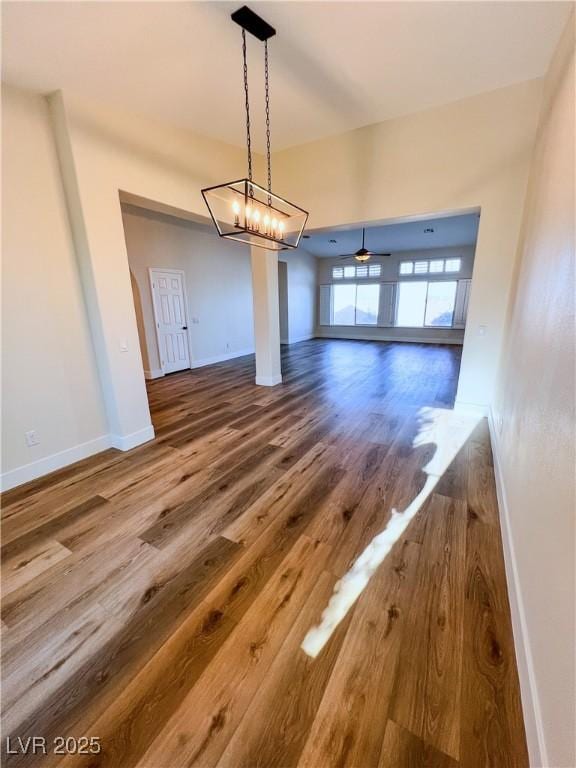 8616 Willow Cabin St, Las Vegas, NV 89131 - unfurnished dining area with wood finished floors and baseboards