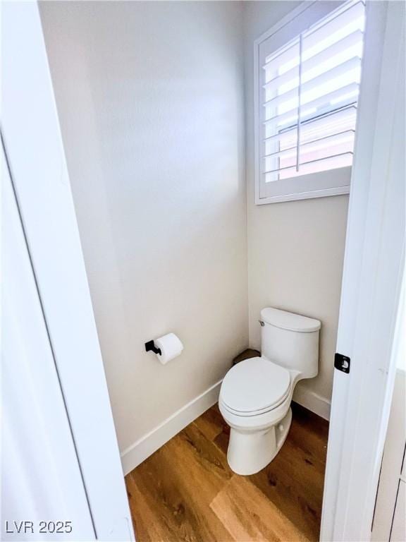 8616 Willow Cabin St, Las Vegas, NV 89131 - bathroom featuring wood finished floors and toilet